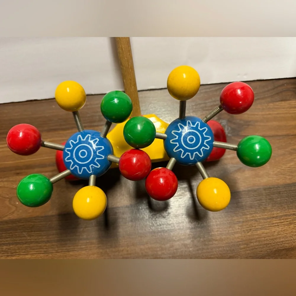 Very Rare vintage Kouvalias Vibrant Wooden Toy with Red, Yellow, Green, and Blue
